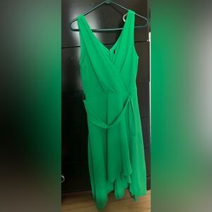 Brand new chiffon-style faux wrap dress. Never worn!